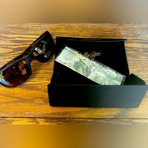 Maui Jim sunglasses! Never worn, box and cleaning cloth included.